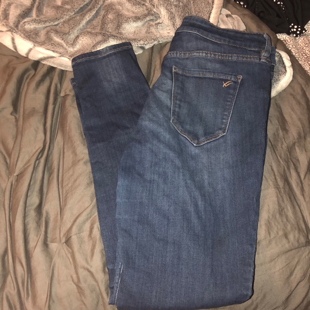 Mid-rise dark wash skinny jeans